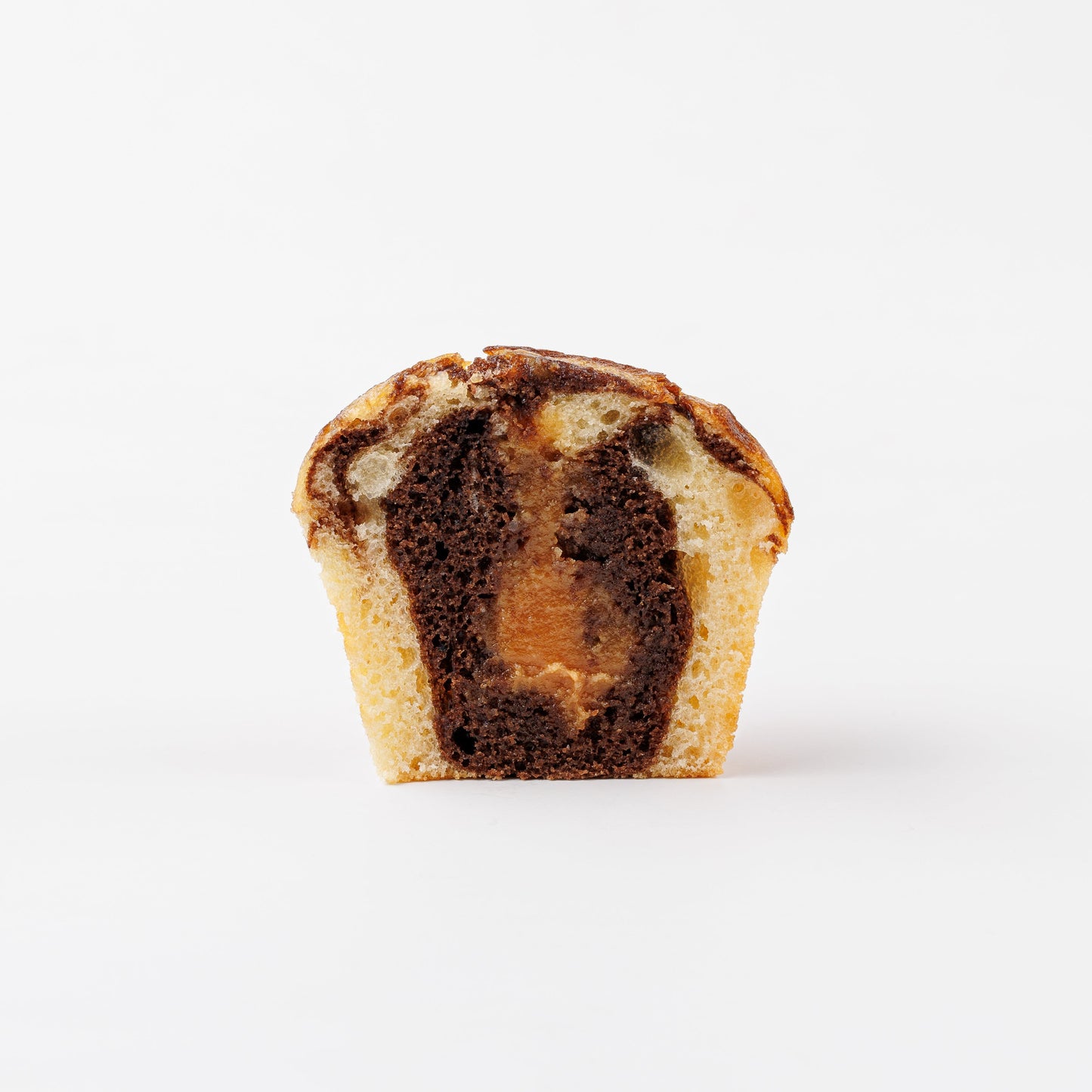 Chocolate Marble Muffin with Caramel Filling Cut in Half