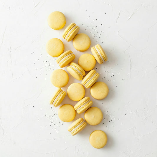 Group of Vanilla Macarons with Vanilla beans