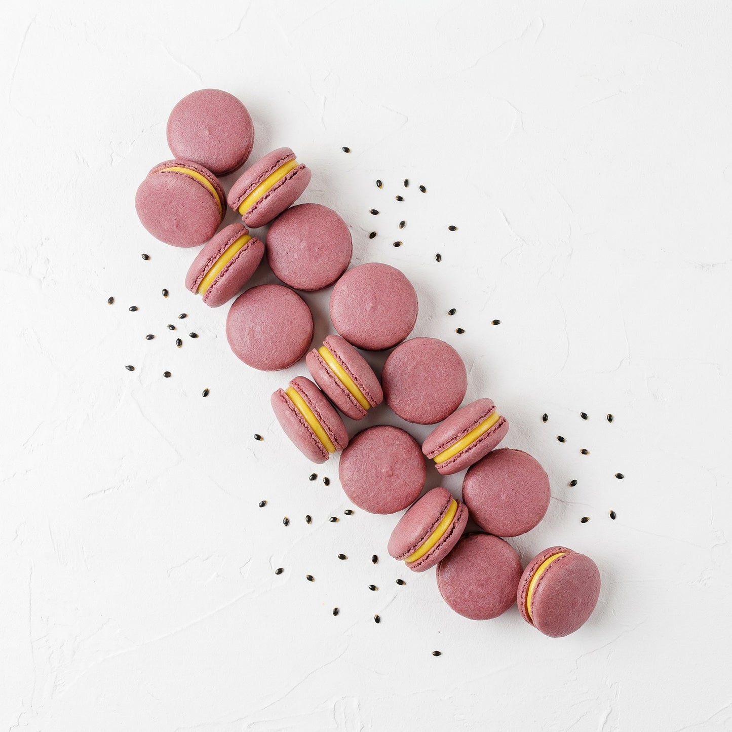 Macarons Purple Passion Fruit with black passion fruit seed specks
